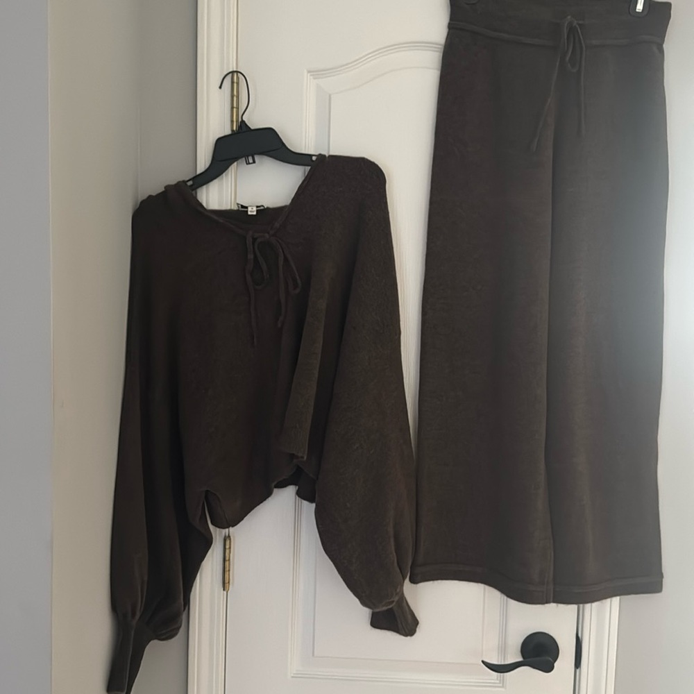New with tags, super cozy, sweater with hood.